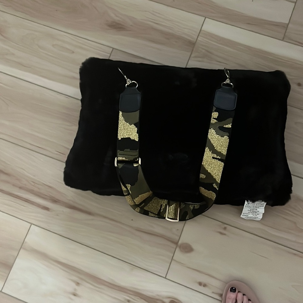 Ahdorned camouflage hand bag strap